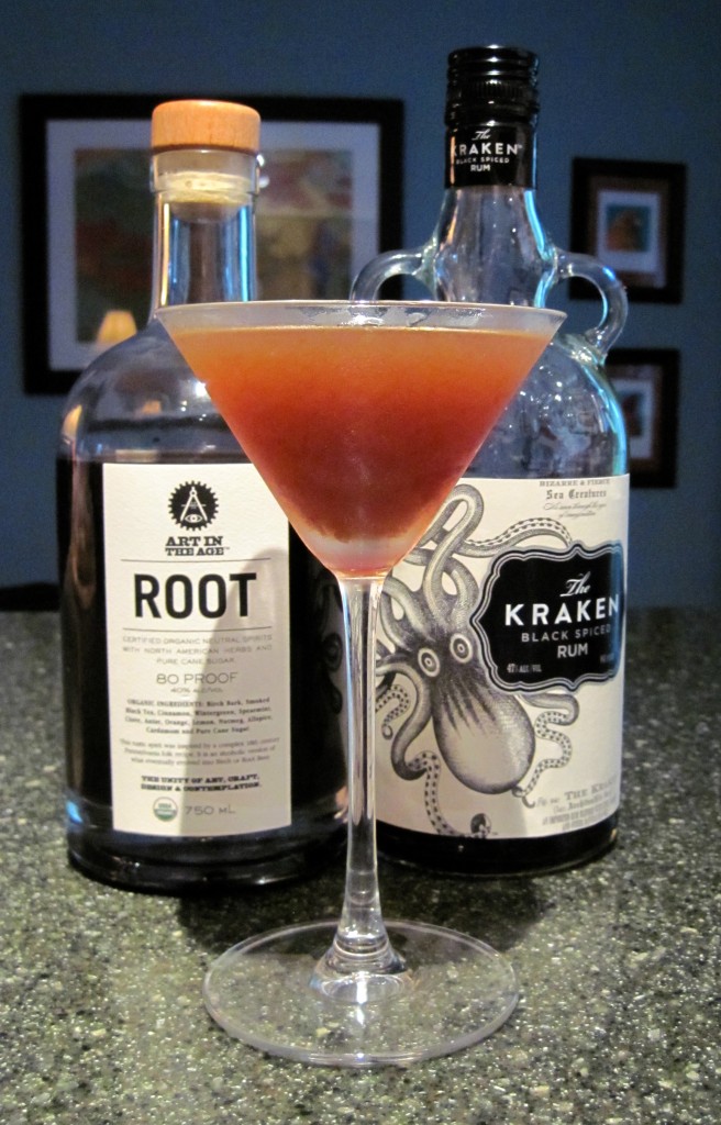 Orange brown cocktail in front of bottles of Kraken Rum and ROOT Liqueur