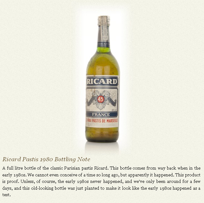 Bottle of Ricard Pastis with marketing text